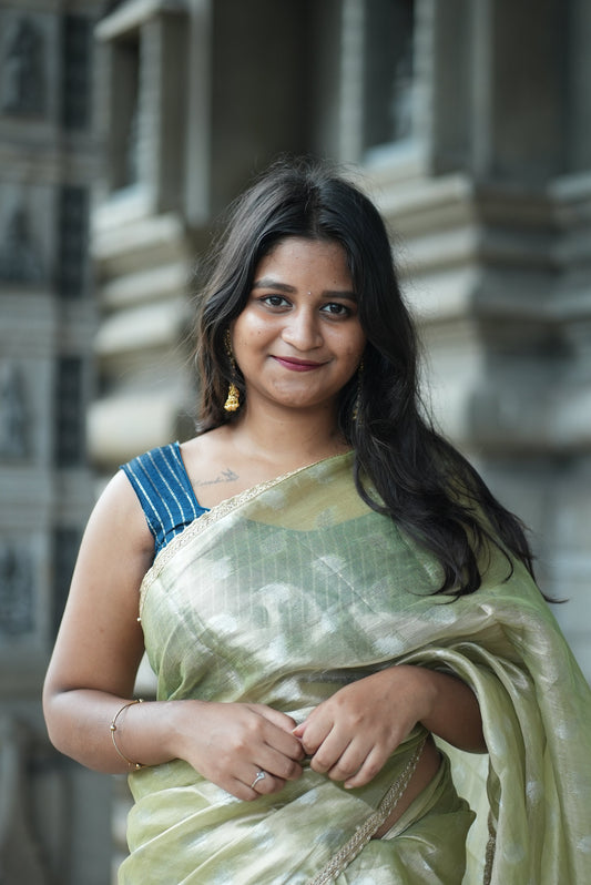 Beautiful Tissue Cotton Saree with shimmering texture – perfect for festive wear.